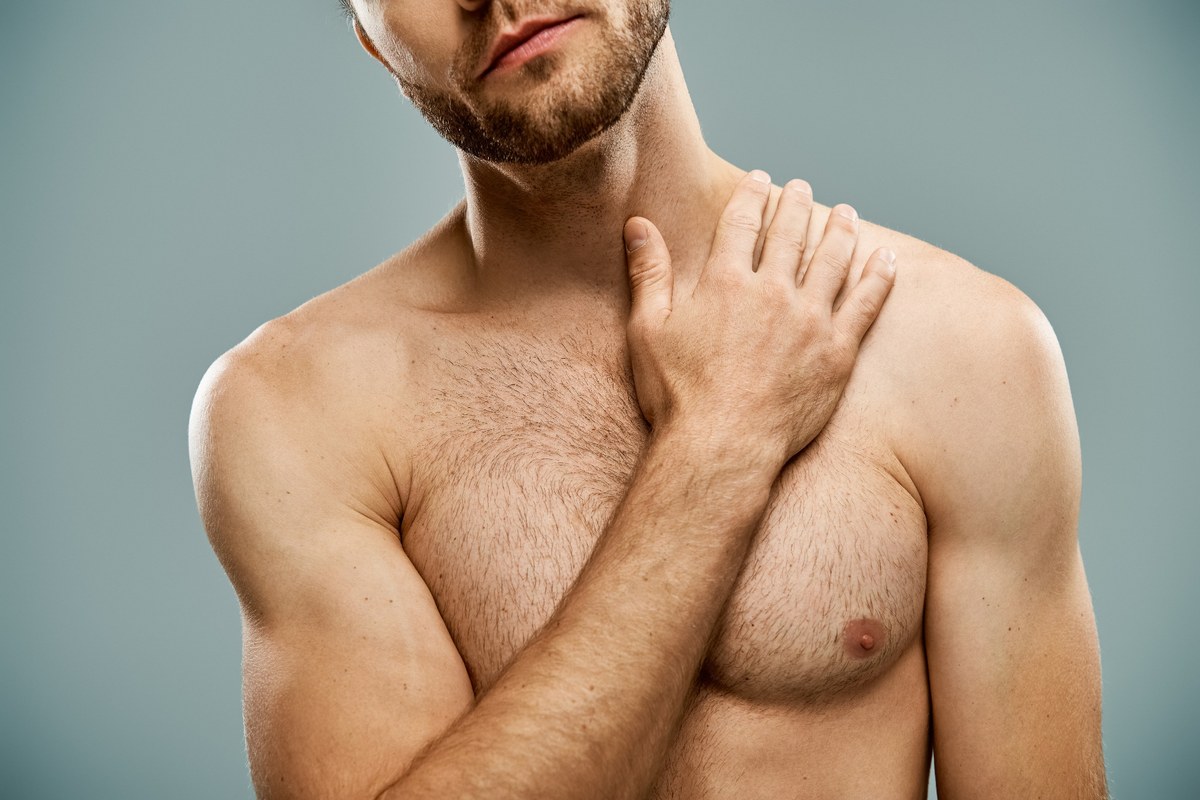 gynecomastia chest discomfort bearded man